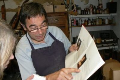 A Proud Father and Luthier Carves Cellos in Bourges