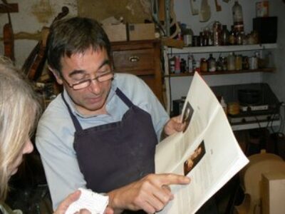A Proud Father and Luthier Carves Cellos in Bourges