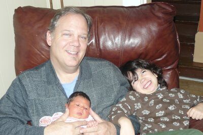 Proud Grandpa and His Grandkids