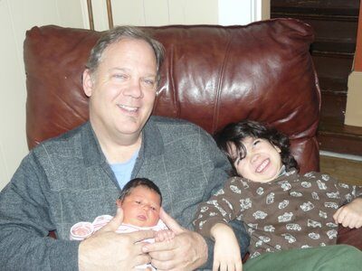 Proud Grandpa and His Grandkids