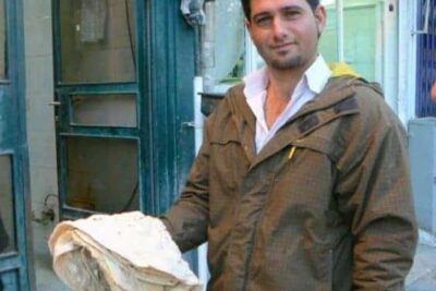 Bread man in Shiraz, Iran.