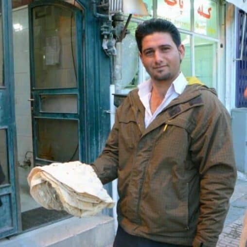 Bread man in Shiraz, Iran.