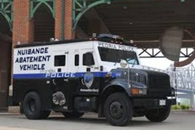 Police Nuisance Property Surveillance Vehicle in Peoria, Illinois.