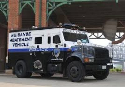 Police Nuisance Property Surveillance Vehicle in Peoria, Illinois.