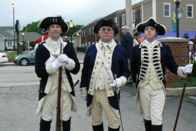 Revolutionary War soldiers get ready for a parade in E. Greenwich RI