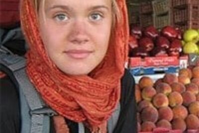 The Woman in the Burqa Smiles Back with Her Eyes