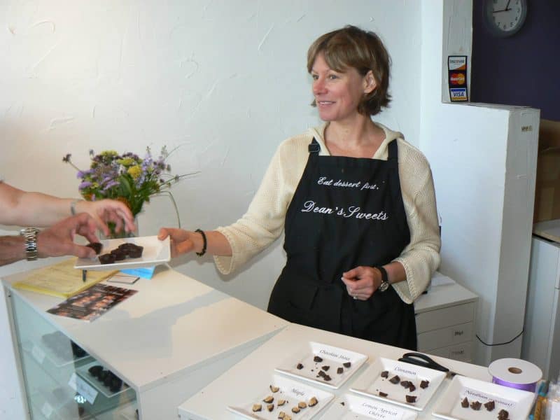 Kristin Bingham serves up truffles at Dean's Sweets.