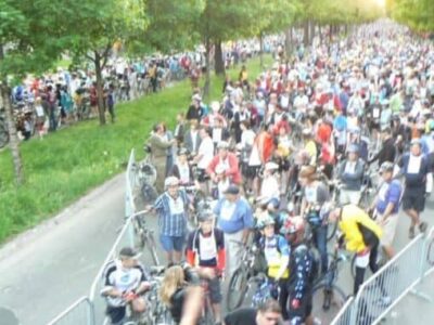 The crowd awaits the start of the Tour de Nuit, on the streets of Montreal.