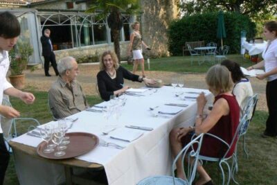 Outdoor dining at Chateau de Lassalle, Lot-en-Garonne, France.