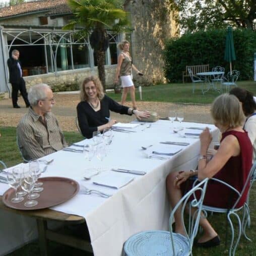 Outdoor dining at Chateau de Lassalle, Lot-en-Garonne, France.