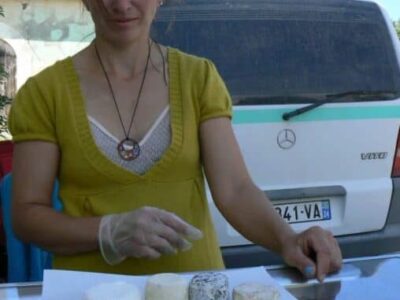 Magalie Berry, goat farmer, selling her wares in Sainte Vincent de Connezac, France.