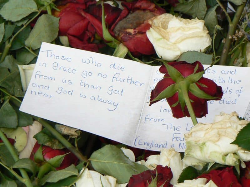 Note with the thousands of flowers left in memoriam at the Cathedral near where the bombing took place in Oslo in July.