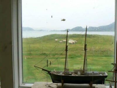 Looking out the window of Ornult Opdahl's studio in Godoy, Norway.