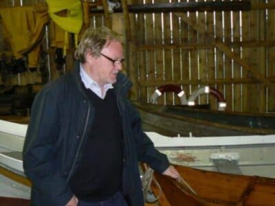 Ornulf Opdahl with his wooden boats in Godoy, Norway.