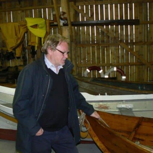 Ornulf Opdahl with his wooden boats in Godoy, Norway.