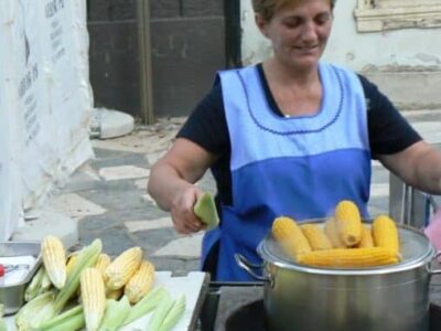 Corn seller in Zagreb, Croatia. People never eat corn at home, only on the streets.