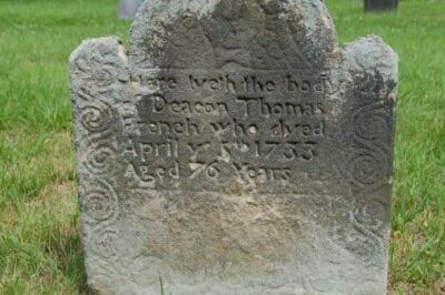 1720s gravestone in Old Deerfield cemetary, with the rounded corners of the period.