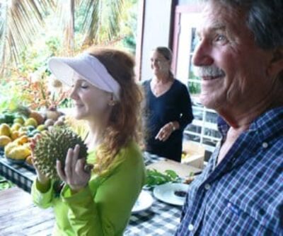 Lilly and Chuck with a happy customer at Ono Organic Farms, Hana Maui.