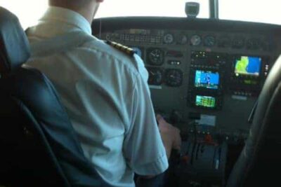 Our Mokulele Airlines pilot Bob, flying to Molokai. No need to close the door.