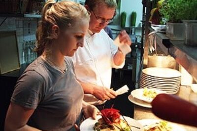 Bob Pollitt, of Matakana Market Kitchen, New Zealand, preparing a plate.
