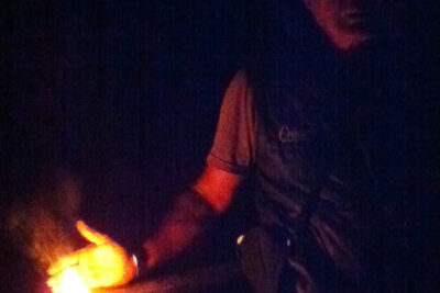 Burning Kauri gum in the forest.