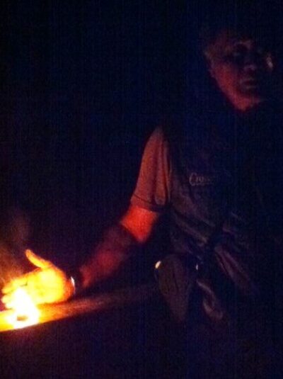 Burning Kauri gum in the forest.