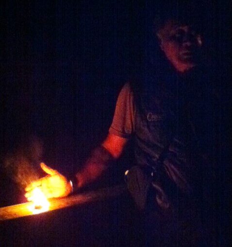 Burning Kauri gum in the forest.