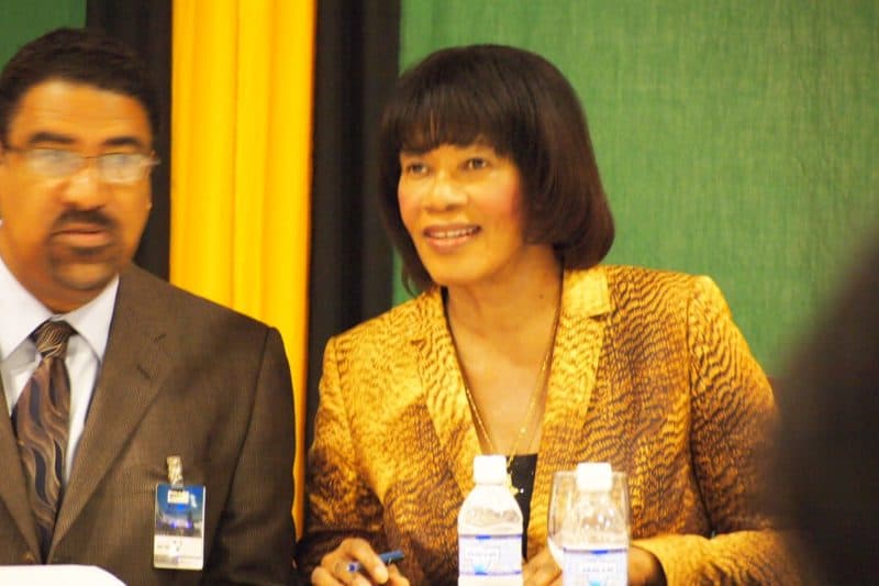 Hon. Portia Simpson Miller, Prime Minister of Jamaica with the tourism minister.