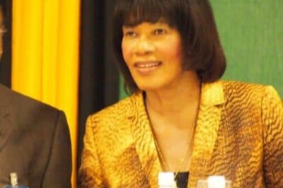 Hon. Portia Simpson Miller, Prime Minister of Jamaica with the tourism minister.