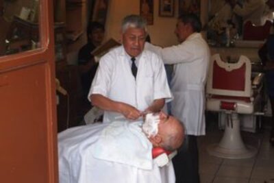 A shave in the Grand Plaza, Quito