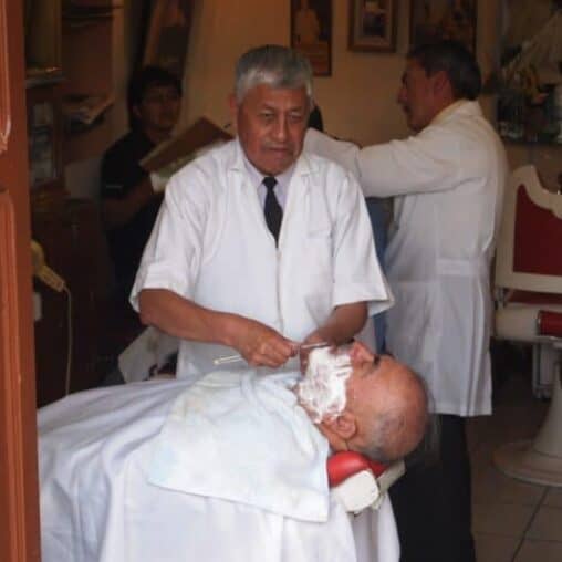 A shave in the Grand Plaza, Quito