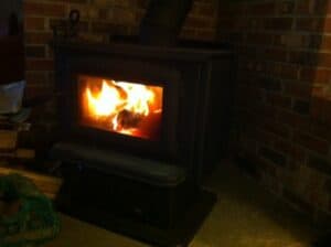 The Woodstove Warms our House and Warms Our Hearts too.