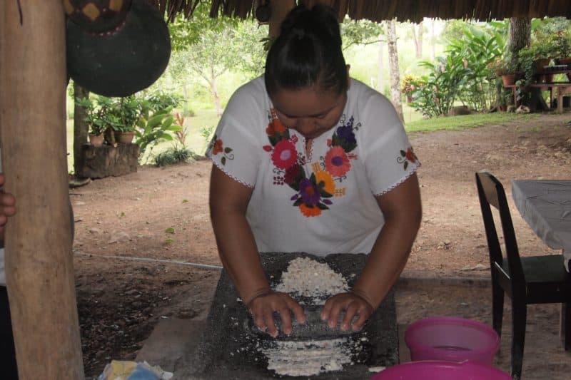 Timotea Mesh makes tortillas in San Antonio, Belize.