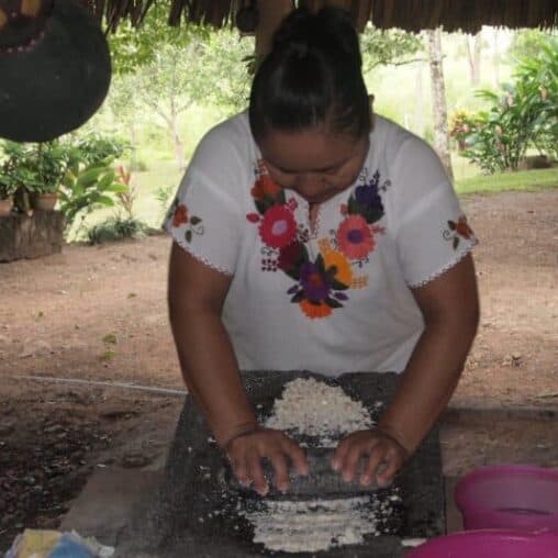 Timotea Mesh makes tortillas in San Antonio, Belize.