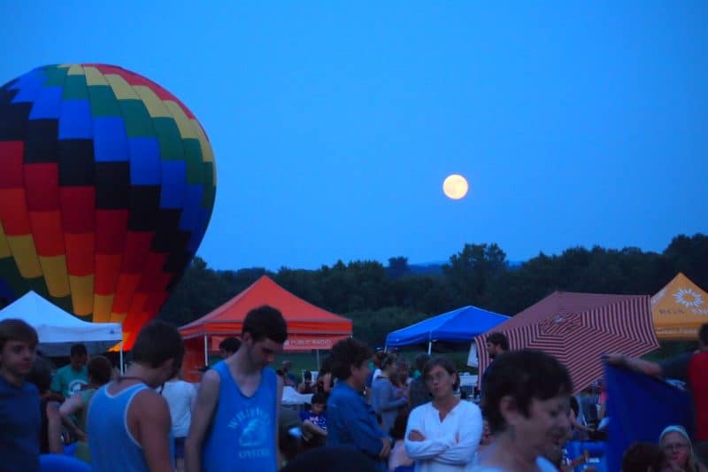 The Supermoon was the subject of nine million cellphone cameras when it made its appearance in orange as the balloons lit up.
