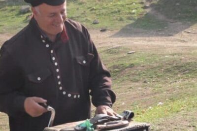A friendly accordian man outside Mtskheta Church.