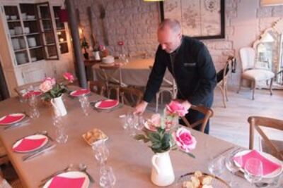 Chef Fred Pouillot sets the table for the lunch we made during his cooking class in Paris.