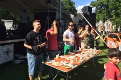 Four contestants vied for the prize of a rock climbing gift certificate by eating five taste dishes as fast as they could.