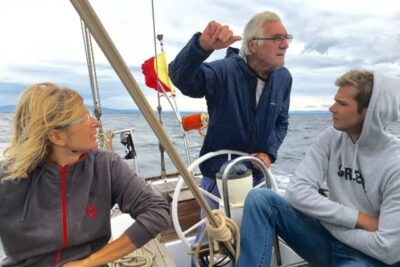 The trio sailing aboard the Santa Maria near the Sinis Peninsula, Sardinia.