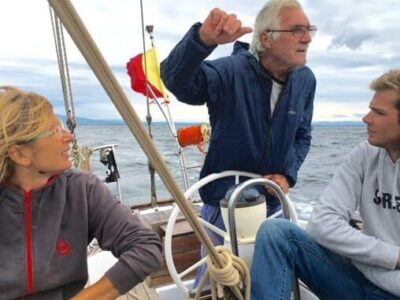 The trio sailing aboard the Santa Maria near the Sinis Peninsula, Sardinia.