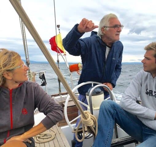 The trio sailing aboard the Santa Maria near the Sinis Peninsula, Sardinia.