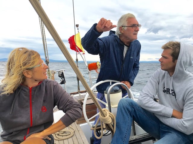 The trio sailing aboard the Santa Maria near the Sinis Peninsula, Sardinia.