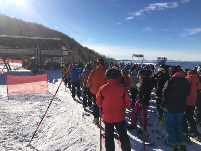 The big lines go quicker if you are taking a ski lesson, and can cut in, as well as for singles who can sneak up a bit to join three others on the 4 person lift.