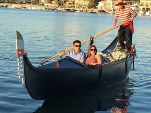A couple comes into the dock after their Gondola Getaway on Naples island.