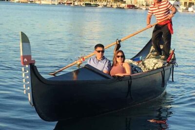 A couple comes into the dock after their Gondola Getaway on Naples island.