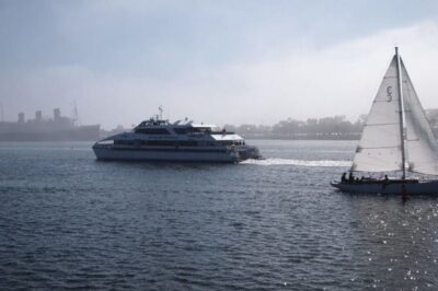 The Catalina ferry in front of the Queen Mary at Rainbow Harbor, Long Beach CA. 