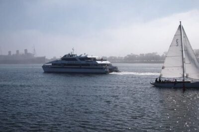 The Catalina ferry in front of the Queen Mary at Rainbow Harbor, Long Beach CA. 
