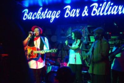 Cameron Calloway, a local soul musician, wowed the crowd with his catchy and positive music at Backstage Bar and Billiards, during the Neon Reverb festival.