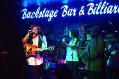 Cameron Calloway, a local soul musician, wowed the crowd with his catchy and positive music at Backstage Bar and Billiards, during the Neon Reverb festival.