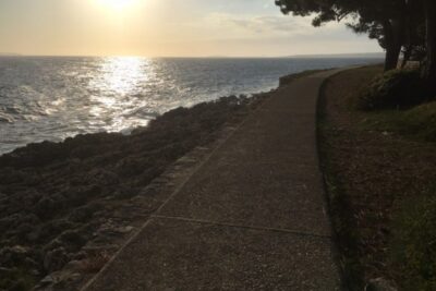 The bike and walking path along Cikat Bay, Mali Losinj, Croatia. 